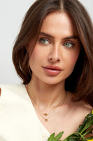 Necklace with knotted charm