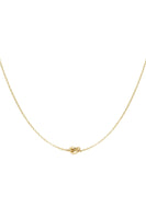 Necklace with knotted charm